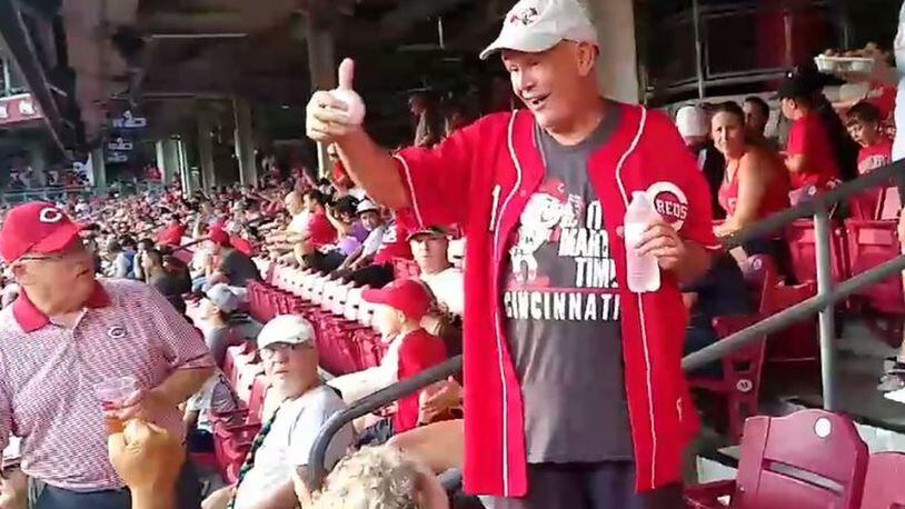 Tom Alf arrives at Great American Ball Park after walking 26 miles from Hamilton to Cincinnati to celebrate his 70th birthday. SUBMITTED PHOTO