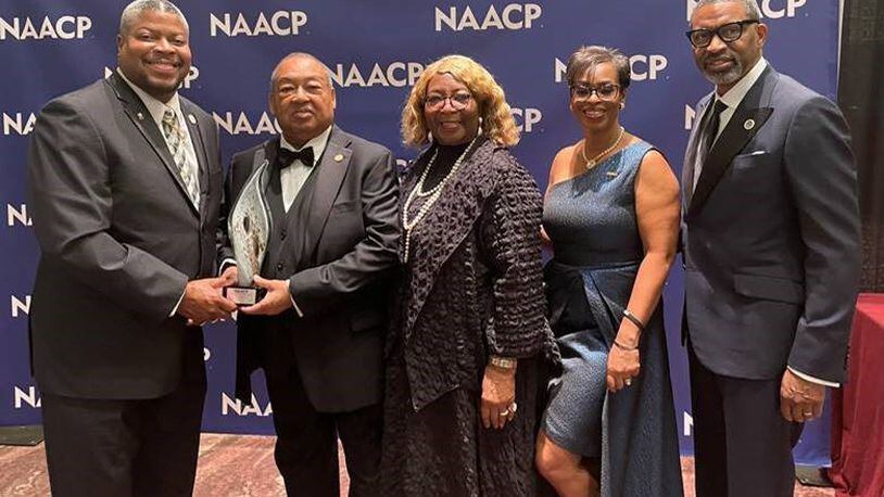 The Dayton Unit NAACP won two national awards at the National Convention of the NAACP in July. Pictured above, fromleft, is Derrick Foward, president of the Dayton Unit, with Leon W. Russell, chair of the National Board of Directors; Gloria Sweetlove, national membership and units chair; Karen Boykin-Townes, vice chair of the National Board of Directors; and Derrick Johnson, NAACP's national president and CEO. CONTRIBUTED