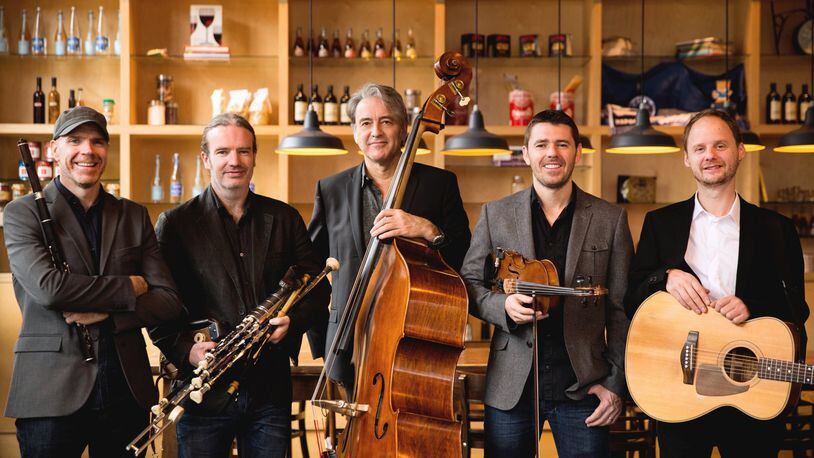 The Vic 150 Series presents Irish group Lúnasa, (left to right) Kevin Crawford, Cillian Vallely, Trevor Hutchinson, Seán Smyth and Ed Boyd, at Victoria Theatre in Dayton on Thursday, March 14. CONTRIBUTED