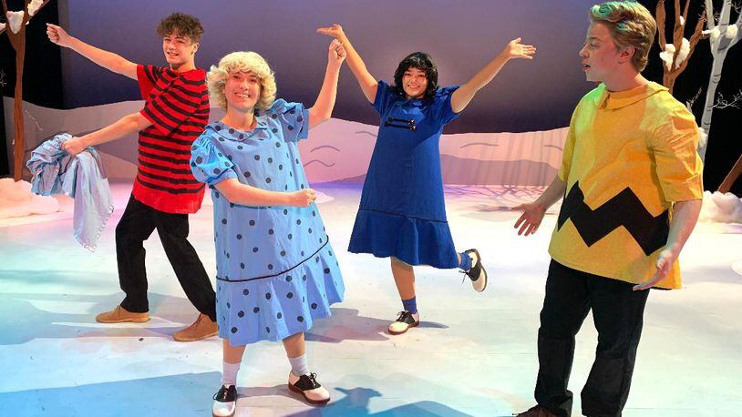 left to right: Ian Spraul (Linus), Helen Grisez (Sally), Alexis Paige (Lucy) and Colin Drayer (Charlie Brown) in Sinclair Community College's production of "A Charlie Brown Christmas."
