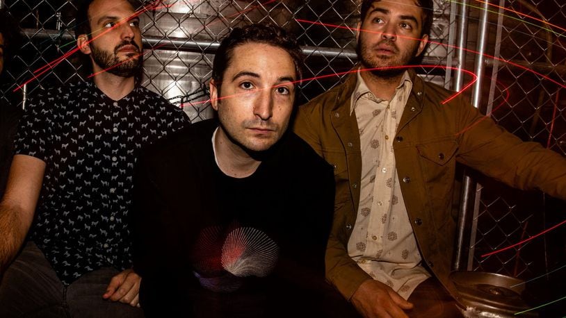 Ian Jacobs, (center), the editor on the forthcoming music documentary on ’90s band Brainiac, brings his Brooklyn-based indie rock band Monograms to Yellow Cab Tavern in Dayton on Friday, Oct. 12. CONTRIBUTED