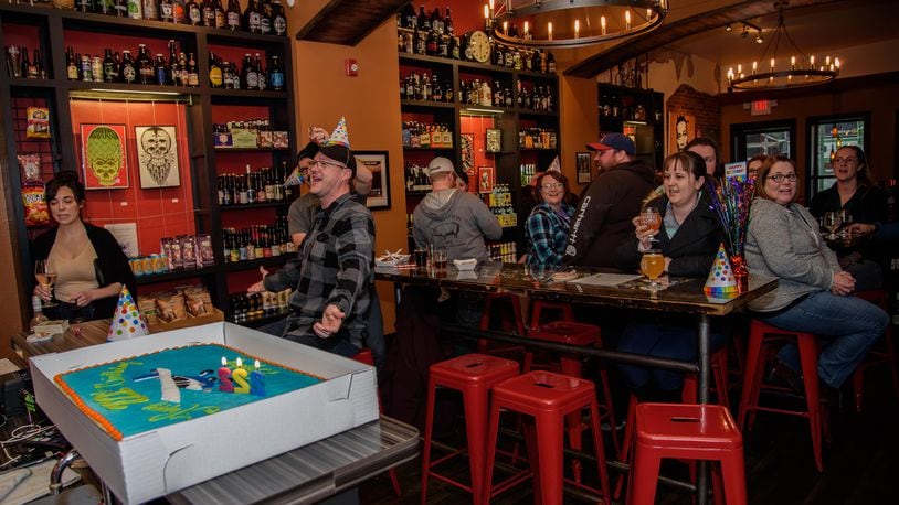 The Barrel House celebrated Dayton's 222 birthday by tapping beer from local breweries, serving food from Underdogs Mobile and featuring entertainment by Dayton musicians on Saturday, March 31. PHOTO / TOM GILLIAM PHOTOGRAPHY