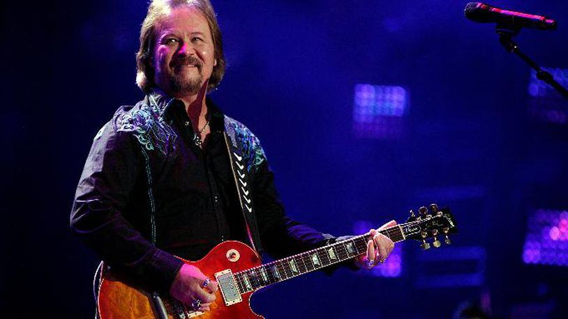 In this Friday, June 6, 2014 file photo, Travis Tritt performs during the CMA Fest at LP Field in Nashville, Tenn.