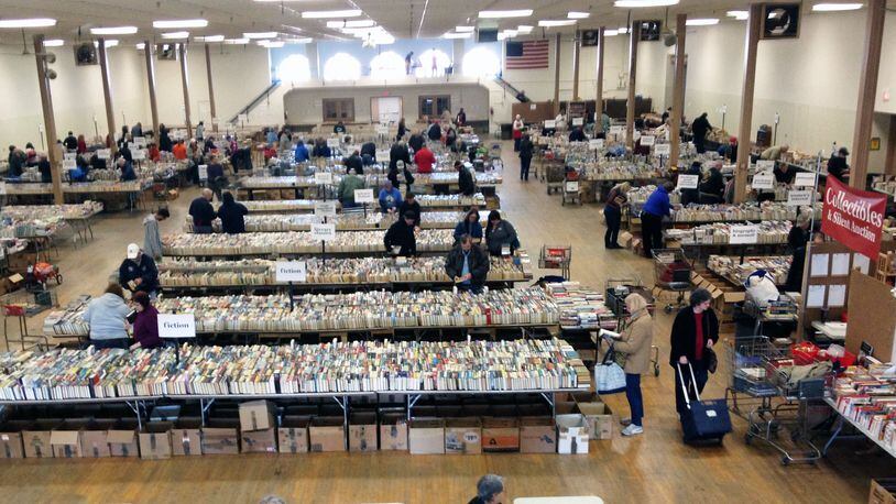 50 tons of donated books are displayed and ready for the doors to open at the Annual Dayton Book Fair at the Montgomery County Fairgrounds. CONTRIBUTED