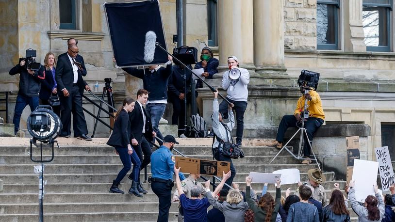 FILE PHOTO: Markus Cook, a native of Butler County, is filming the sequel to his 2019 film Alan and the Fullness of Time. This sequel, titled "Alan and the Rulers of the Air" will be shot in Hamilton, Covington, Ky., and various parts of the Cincinnati region. These scenes were shot at the historic Butler County Courthouse Monday, Feb. 21, 2022, in Hamilton. NICK GRAHAM/STAFF