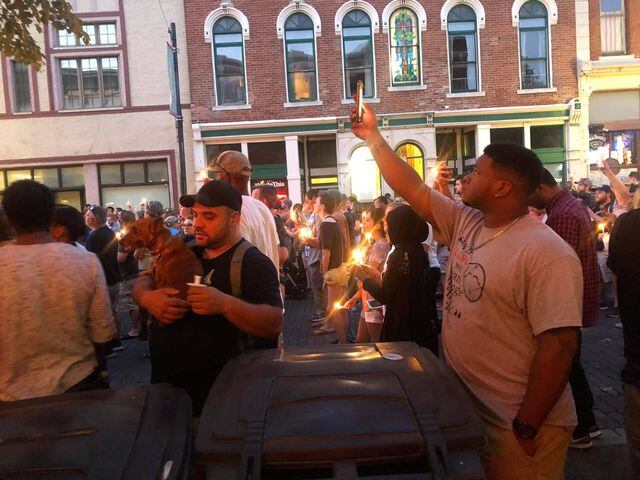 PHOTOS: Candlelight vigil in Dayton after shooting