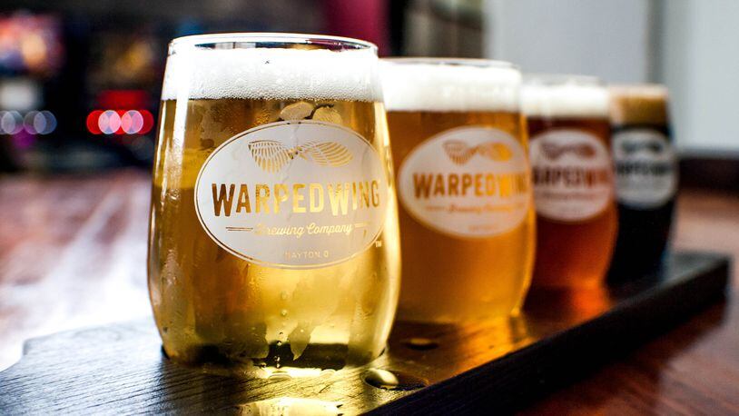 A flight of beers from Warped Wing's downtown Dayton location. CONTRIBUTED