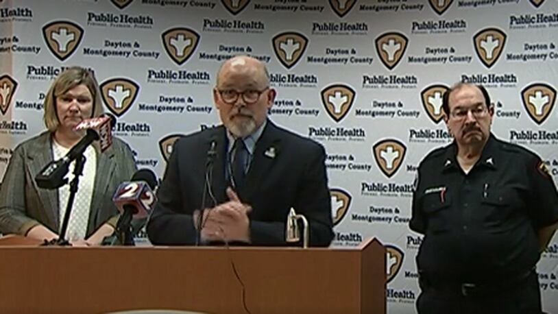 Health Commissioner Jeff Cooper of Public Health - Dayton & Montgomery County speaks during a daily coronavirus update on Thursday, March 19, 2020. At left is Dayton Mayor Nan Whaley and at right is Dave Gerstner of the Regional Medical Response System and Dayton Fire Department EMS.