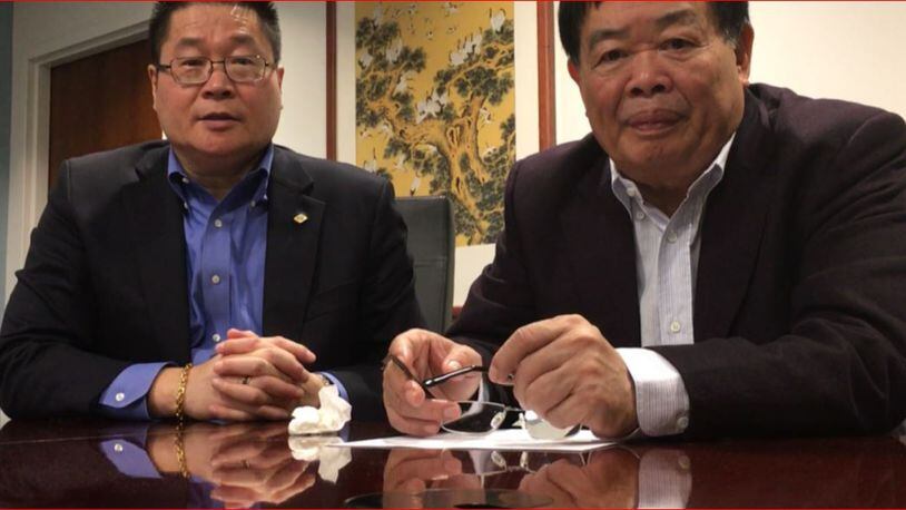 From left, Jeff Liu, president and chief executive of Fuyao Glass America, and Cho Tak Wong, chairman of Fuyao Global. THOMAS GNAU/STAFF