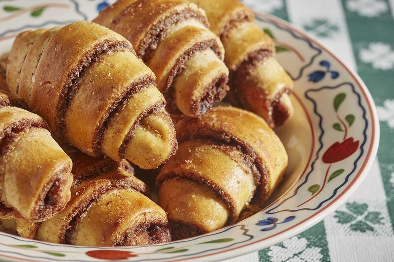 Rugelach are rolled up pastry dough with jam, raisins, chocolate and/or nuts rolled into them. SHUTTERSTOCK