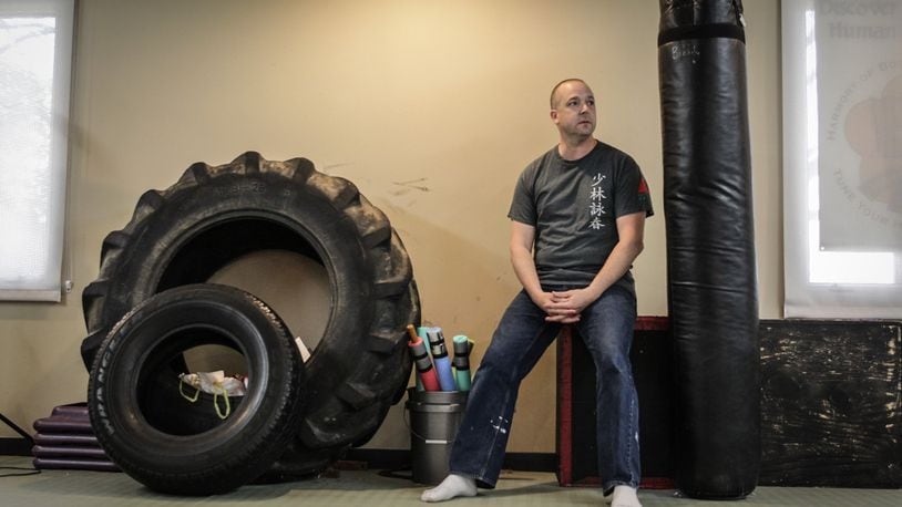 Jeremy Roadruck, owner of Meng’s Martial Arts in Centerville, may have to rebuild his business model because of strict social distancing. JIM NOELKER/STAFF