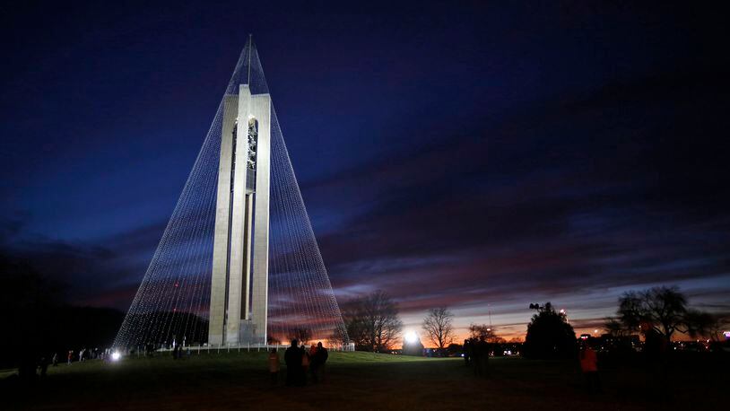 Dayton History has transformed the Deeds Carillon at Carillon Park into a huge lighted Christmas Tree. The big tree was illuminated on Tuesday evening. A colorful sunset faded just before the lighting of the tree. TY GREENLEES / STAFF