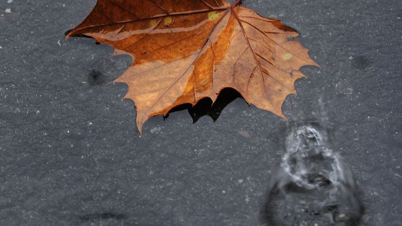 A rain drop hits a puddle in Greene County on Thursday, Oct. 29, 2020, as heavy rains from the Hurricane Zeta air mass soaked the area. MARSHALL GORBY\STAFF