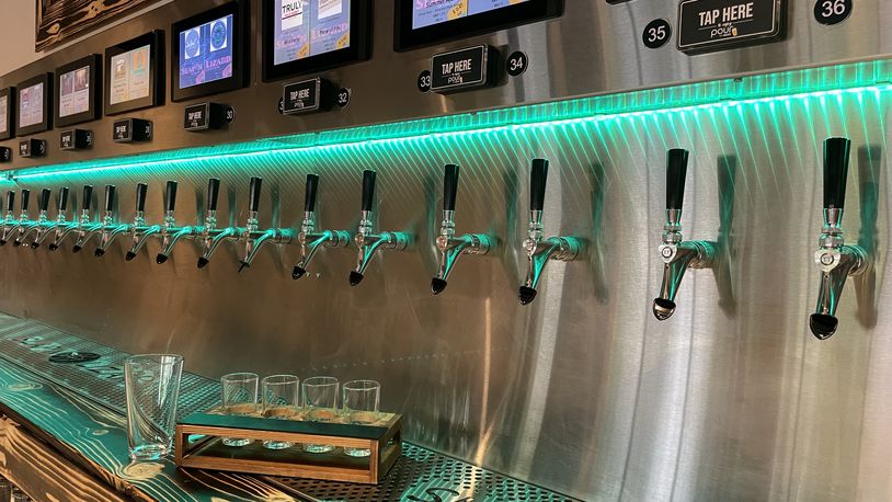 The Slap’n Lizard, a self-pour tap house in West Carrollton, is officially opening its doors to the public on Wednesday, June 28 from 3 p.m. to 10 p.m. through a soft opening. NATALIE JONES/STAFF