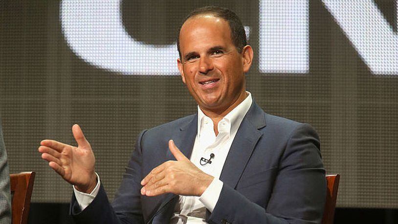 Chicago entrepreneur Marcus Lemonis said fines and possible jail time won't deter him from displaying an American flag, deemed too large by local government, outside his North Carolina RV store.