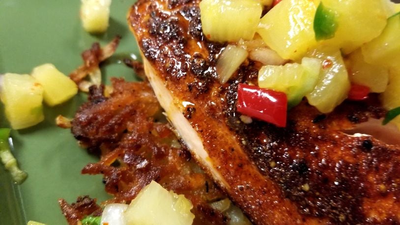 The menu at Dewberry 1850 includes salmon —seven spiced salmon , pineapple relish |potato latke.