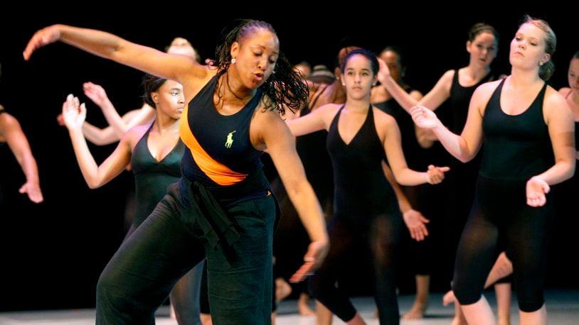 DeShona Pepper Robertson (left) teaches an advanced dance class during a summer immersion dance camp at Stivers School for the Arts in Dayton. LISA POWELL / STAFF