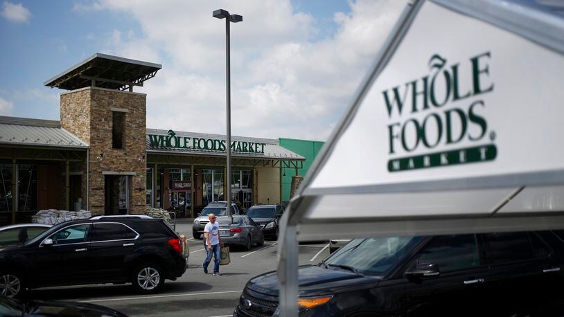 Whole Foods is testing grocery pickup in 30 minutes, with plans to expand the program this year. Bloomberg photo by Luke Sharrett