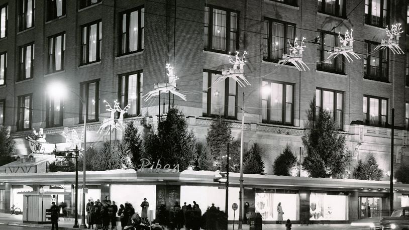 Visitors take in the windows of Rike's department store in 1952.  Frederik Rike, owner of the Rike-Kumler Co., moved the Christmas window displays from New York City to downtown Dayton in 1945. DAYTON DAILY NEWS / WRIGHT STATE UNIVERSITY SPECIAL COLLECTIONS