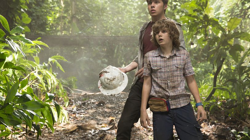 This photo provided by Universal Pictures shows, Nick Robinson, left, and Ty Simpkins in a scene from the film, "Jurassic World," directed by Colin Trevorrow, in the next installment of Steven Spielberg's groundbreaking "Jurassic Park" series. The 3D movie releases in theaters by Universal Pictures on June 12, 2015. (Chuck Zlotnick/Universal Pictures via AP)