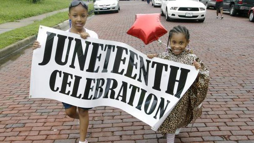Kickoff parade for the 10th Annual Dayton Juneteenth Festival.