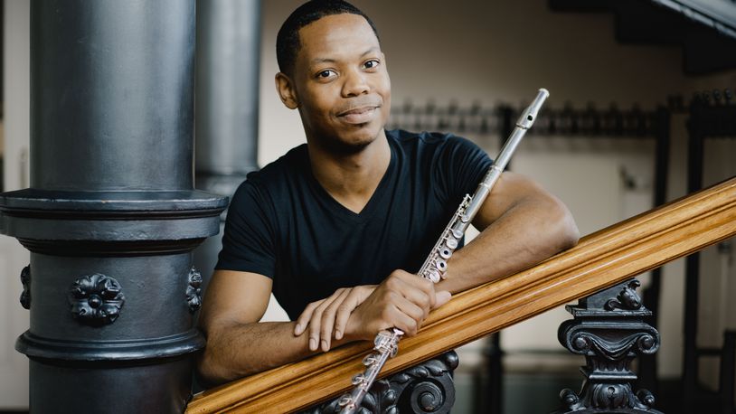 Dayton native Brandon Patrick George is a Grammy-nominated flutist. He returns home this month to perform with the Dayton Philharmonic Orchestra. MARCO BORGGREVE/COURTESY PHOTO