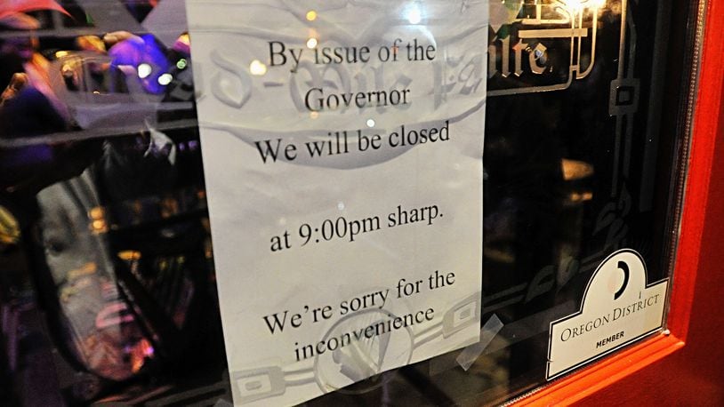 Dublin Pub sign shows the restaurant's compliance to close under the order of Ohio Governor Mike DeWine. Ohio bars and restaurants have no dine-in options as long as the coronavirus pandemic is a threat. Staff photo Marshall Gorby.