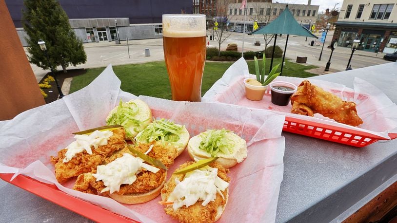 The restaurant @ The Square on Central Avenue in downtown Middletown is renovating its rooftop patio bar and adding new scratch-made food items such as chicken sliders and crab rangoon eggrolls. NICK GRAHAM/STAFF