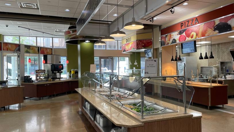 The RFFG Marketplace, located at 110 N. Main St. in downtown Dayton, features grab-and-go options, a salad bar, hot breakfast bar, grill station, pizza station and homestyle station. NATALIE JONES/STAFF