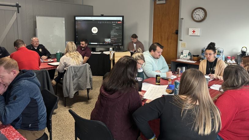 Representatives of agencies working regularly with Miami County’s Child Advocacy Center gathered in December for discussion and to observe the program’s first year of service. CONTRIBUTED