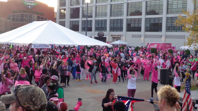 Thousands of walkers gather at last year’s Making Strides Against Breast Cancer walk outside Fifth Third Field in downtown Dayton. CONTRIBUTED
