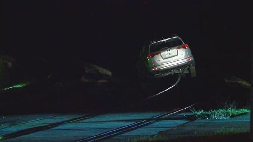 Police found a man parked on railroad tracks. (Photo: WFTV.com)