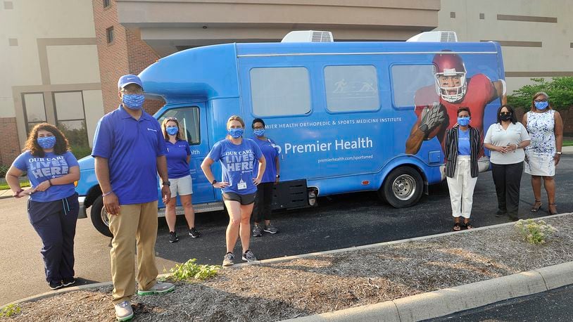 Employees of Premier Health, deliverd COVID-19 kits Tuesday, at various churches, made possible from the 2020 virtual African American Wellness Walk. The African American Wellness Walk promotes physical, mental, emotional, and social health and justice in the community. MARSHALL GORBY\STAFF