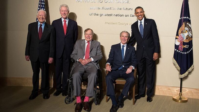 FILE PHOTO: In this handout provided by the George W. Bush Presidential Center, former U.S. presidents (L-R) Jimmy Carter, Bill Clinton, George H.W. Bush, George W. Bush and President Barak Obama pose at the opening of the George W. Bush Presidential Center April 25, 2013 in Dallas, Texas.  (Photo by Paul Morse/George W. Bush Presidential Center via Getty Images)