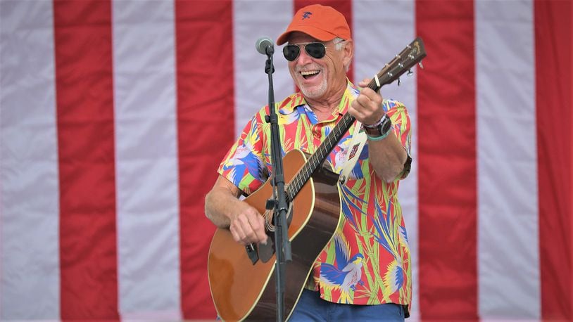 WEST PALM BEACH, FLORIDA - NOVEMBER 03: Jimmy Buffett plays a song as he performs at a Get Out the Vote rally for U.S. Senator Bill Nelson (D-FL) and Florida Democratic governor candidate Andrew Gillum at the Meyer Amphitheatre on November 03, 2018 in West Palm Beach, Florida. Mr. Buffett was encouraging people to vote for Sen. Nelson and Mayor Gillum who are in tight races against their Republican opponents. (Photo by Joe Raedle/Getty Images)