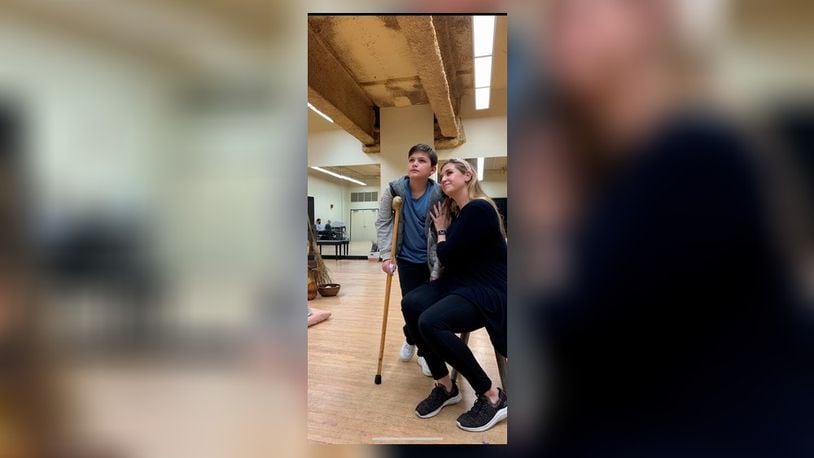 Aaron Exman (Aamhl Cover and Page Apprentice) and Rebecca Krynski Cox (Amahl's Mother) in rehearsal for Dayton Opera's production of "Amahl and the Night Visitors." CONTRIBUTED