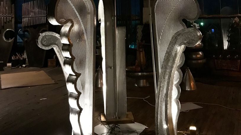 The side pieces of Michael Bashaw's latest sculpture assembled in his studio. The side fiddlehead ferns stand at 7 feet tall and the center piece is over 18 feet tall. CONTRIBUTED