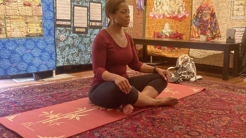 Yoga instructor Kaye Edwards and the Dayton International Peace Museum are offering virtual classes. CONTRIBUTED