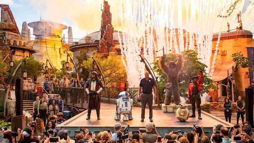 Bob Chapek, chairman of Disney Parks, Experiences and Products, is joined by beloved Star Wars characters during the Aug. 28, 2019, dedication for Star Wars: Galaxy’s Edge at Disney’s Hollywood Studios.