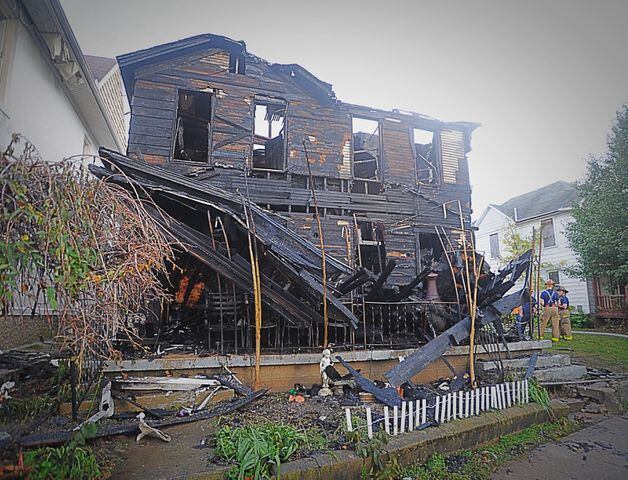 PHOTOS: Fire destroys Dayton home
