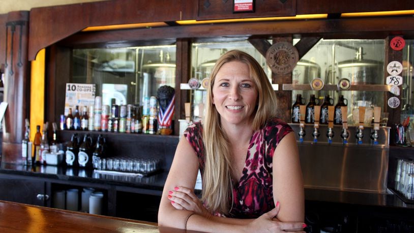 Fifth Street Brewpub has raised $50,000 for local charities since it launched its giveback Monday program in 2013.  Tanya Brock is the pub's general manager.