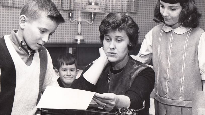 Erma Bombeck at home with her kids, from left to right, Andy, Matt and Betsy. DAYTON DAILY NEWS FILE