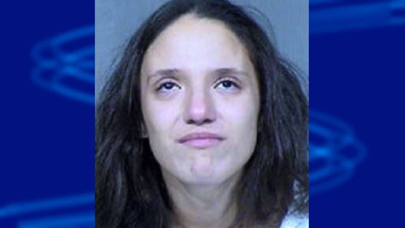 Rachel Henry is accused of smothering her three children while singing to them, police said.