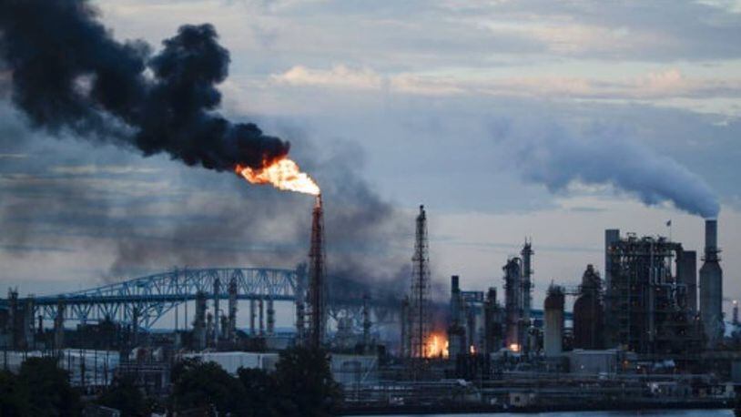 Flames and smoke billow from the Philadelphia Energy Solutions Refining Complex early Friday.