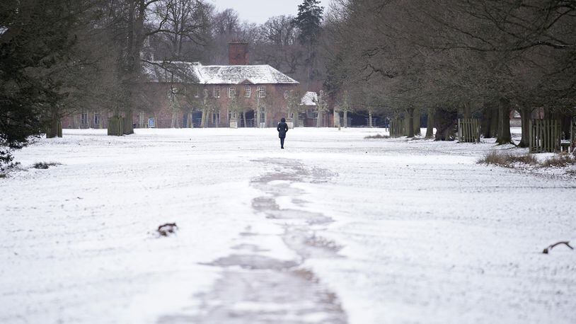 FILE PHOTO: Snow covers the woodland at the National Trust's Dunham Massey Park during a weather front that has been dubbed the 'mini beast from the East' on March 18, 2018 in Altrincham, England.