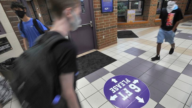 Bellbrook High School started it's second first day of classes Tuesday, Aug. 18. All students and staff were wearing masked and practicing social distancing. MARSHALL GORBY\STAFF