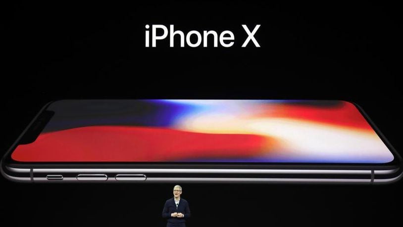 Apple CEO Tim Cook announces the new iPhone X at the Steve Jobs Theater on the new Apple campus, Tuesday, Sept. 12, 2017, in Cupertino, Calif.AP Photo/Marcio Jose Sanchez