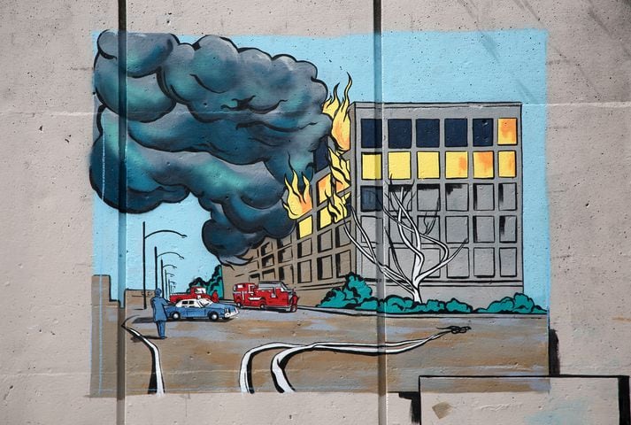 PHOTOS: Comic book style mural honors Dayton Fire Department history