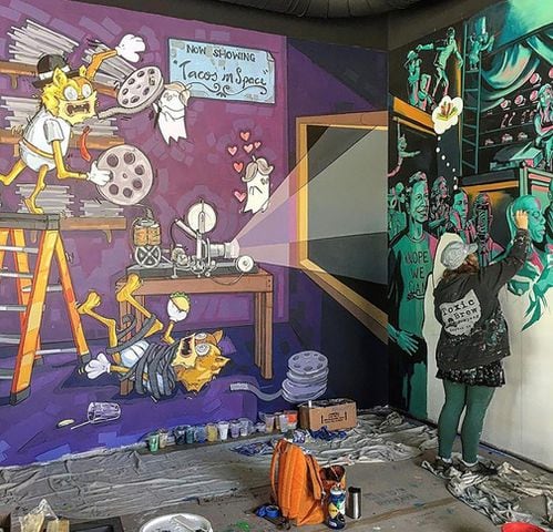 PHOTOS: Wild and wacky murals take over new restaurant at The Greene