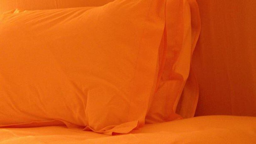 Pillows on bed (stock photo). (Photo credit: clarita via Morguefile.com)